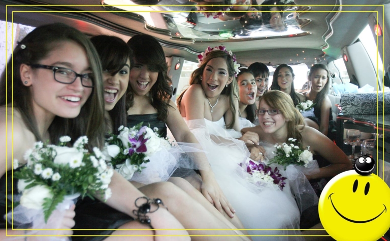 Quinceanera with girls entourage in a limousine