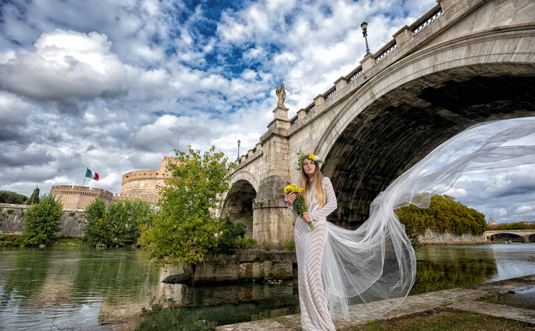 Bride at Vatican's bridge in Rome