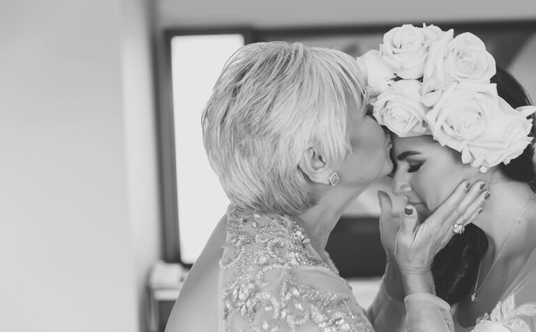 Mother of the bride blessing kiss, Wedding candid shot Black and White