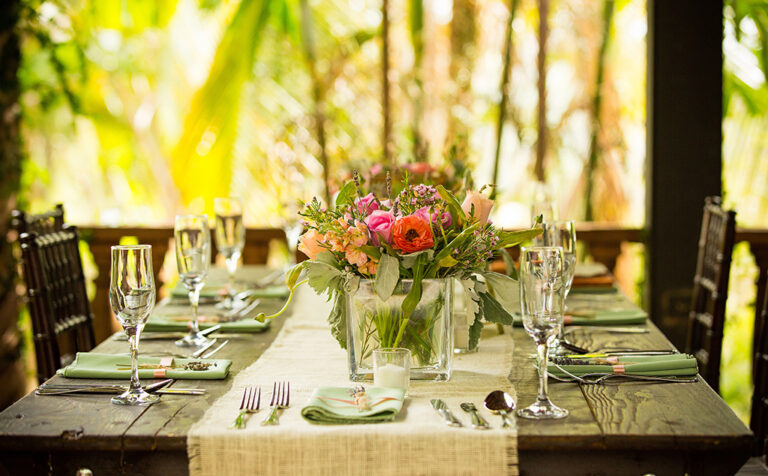 Rustic wedding table reception with chargers at Hacienda Siesta Alegre