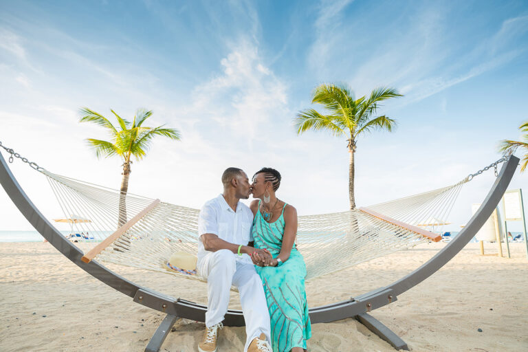 Couple in Hammock at Courtyard By Marriott Isla Verde Beach Resort