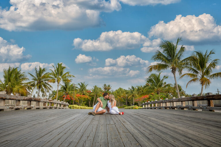 Couple kissing in a bridge at St. Regis Bahia Beach Resort